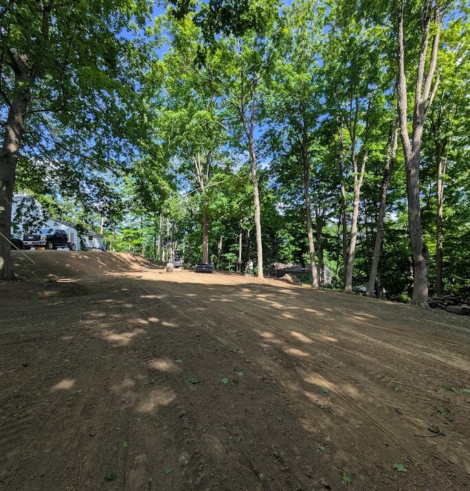 Transforming Uneven Land into a Perfect Lawn: A Recent Project by IronTrack Excavators LLC